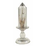 Obelisk shaped paperweight made of transparent glass and submerged tutti colori. Murano. Italy.