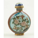 Metal snuff bottle with cloisonné enamel. China. Late 19th century.With floral decoration. 6,1 x 4,5