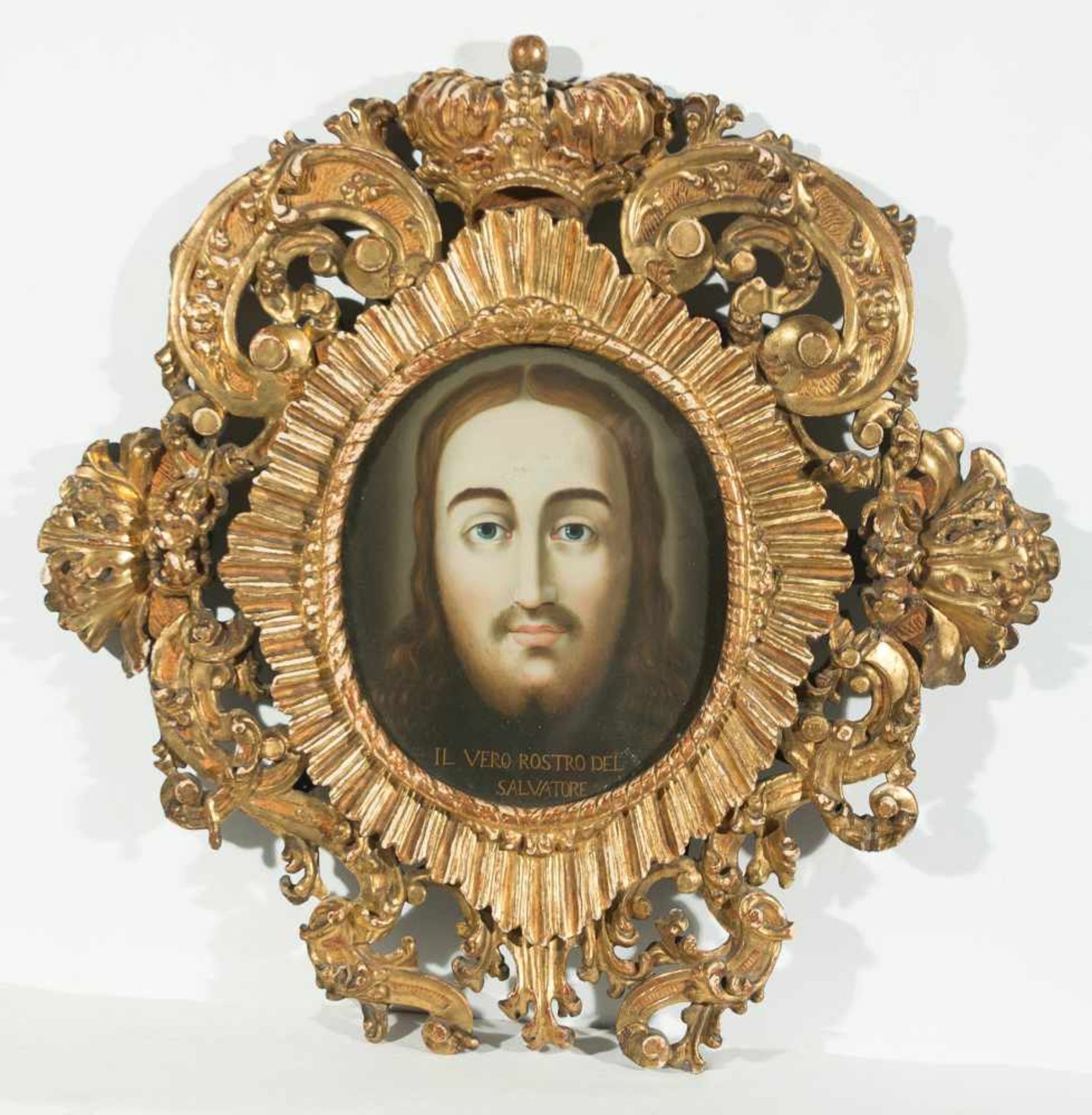 16th century Italian School "Veil of Veronica" Oil on cboard. In an 18th century carved and gilded
