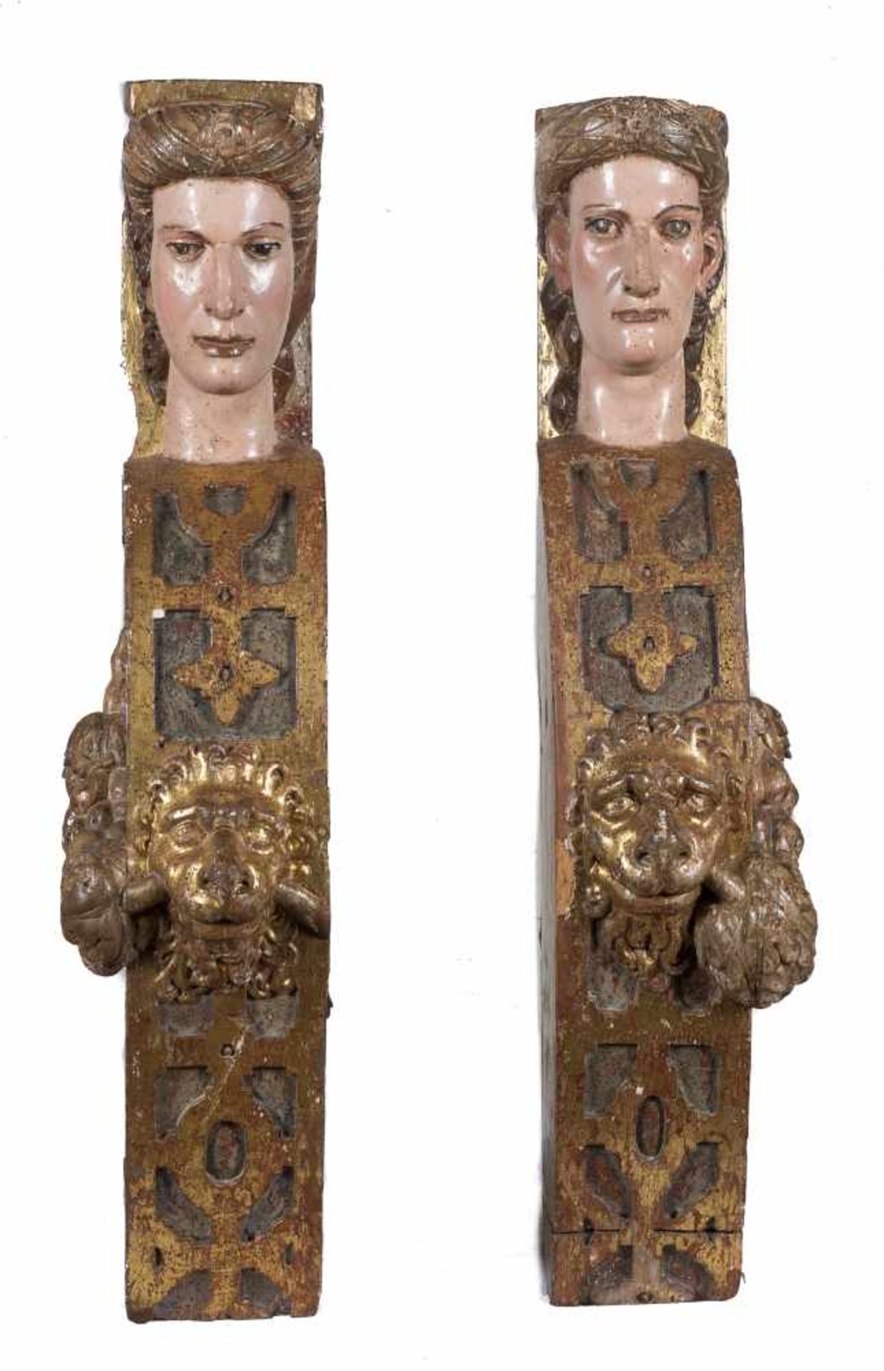 Pair of carved, gilded and polychromed wooden caryatids. 16th century. 84 x 18 x 30 cm. each.