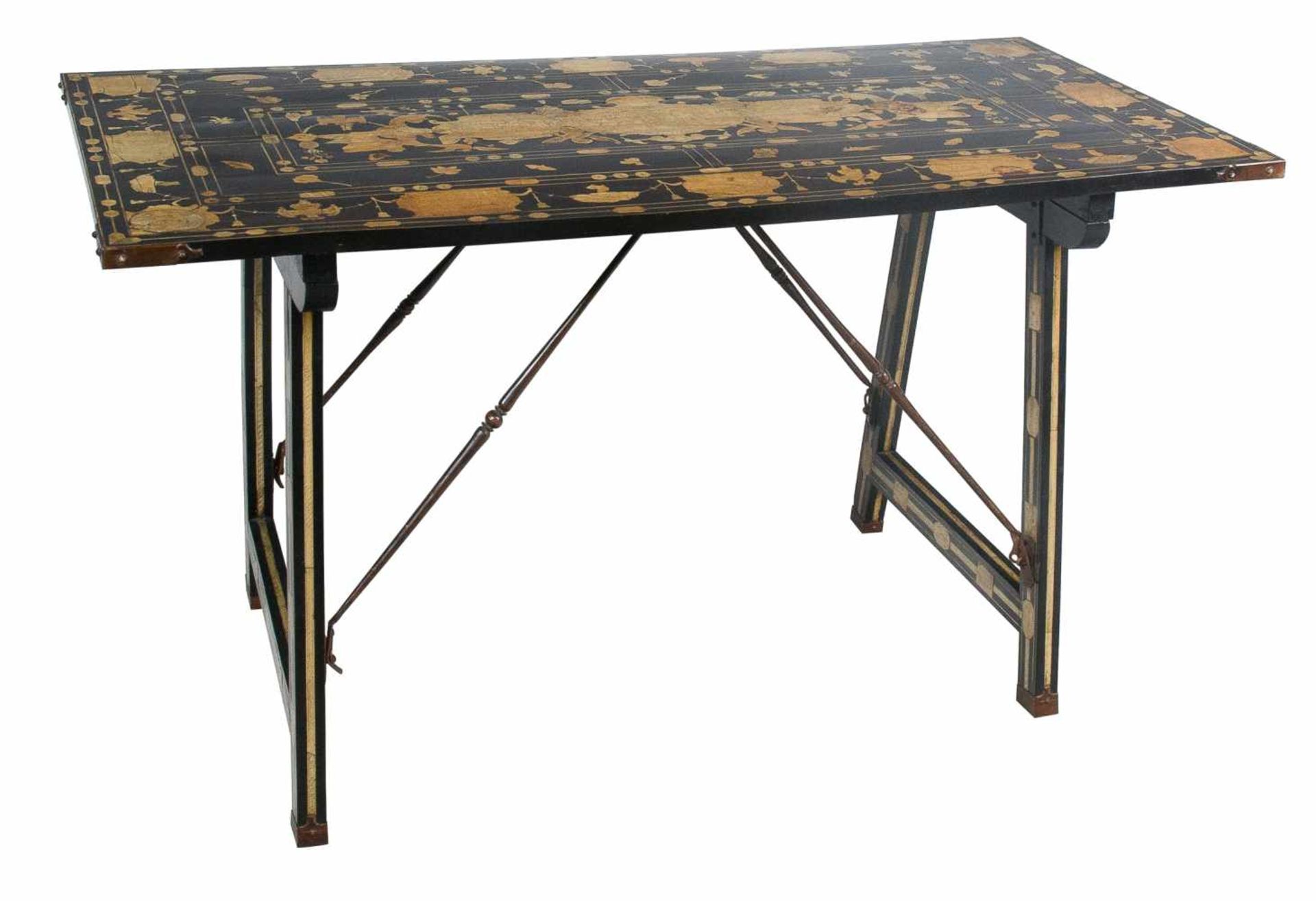 Table veneered in ebony with engraved, inked ivory plates and iron fittings. Naples, Italy. Late