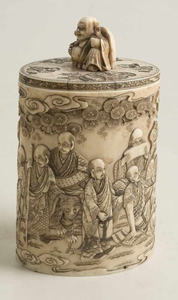 Sculpted ivory jar. Japan. Late 19th century.Decorated with Arhats under clouds and pine trees. - Image 3 of 7