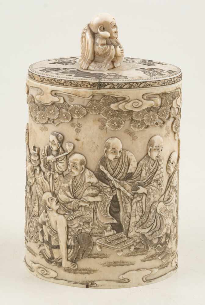 Sculpted ivory jar. Japan. Late 19th century.Decorated with Arhats under clouds and pine trees. - Image 2 of 7