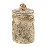 Sculpted ivory jar. Japan. Late 19th century.Decorated with Arhats under clouds and pine trees.