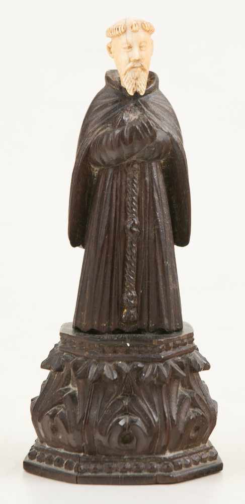 "Franciscan monk” Sculpted wood and ivory figure. Indo-Portuguese. 17th – 18th century.Total height:
