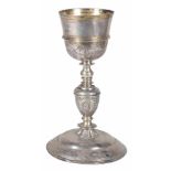 Embossed and chased silver chalice. Colonial. Mexico. 17th century.Vermeil interior. The cup is