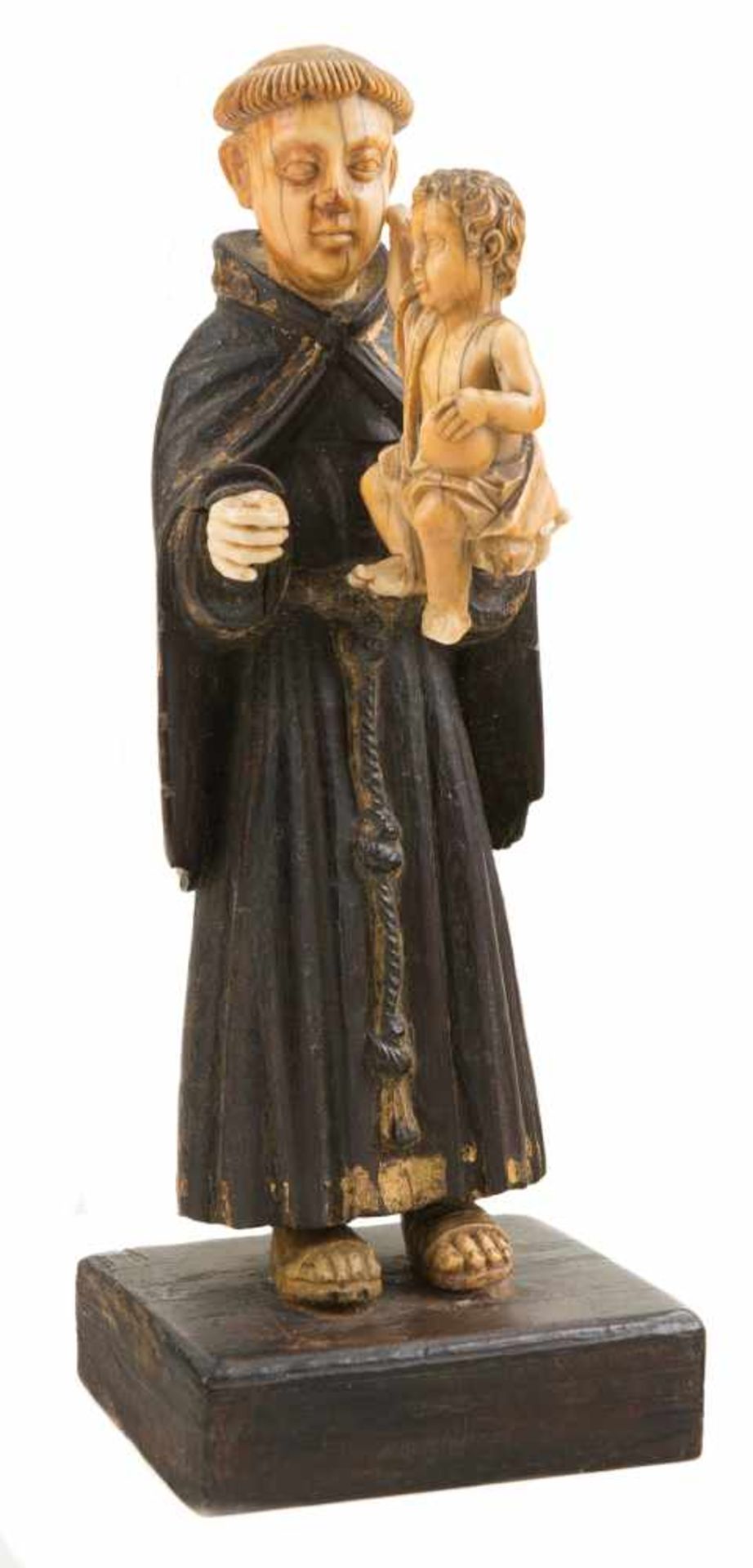 "Saint Anthony with the Christ Child" Sculpted ivory figure. Indo-Portuguese. 17th-18th century.