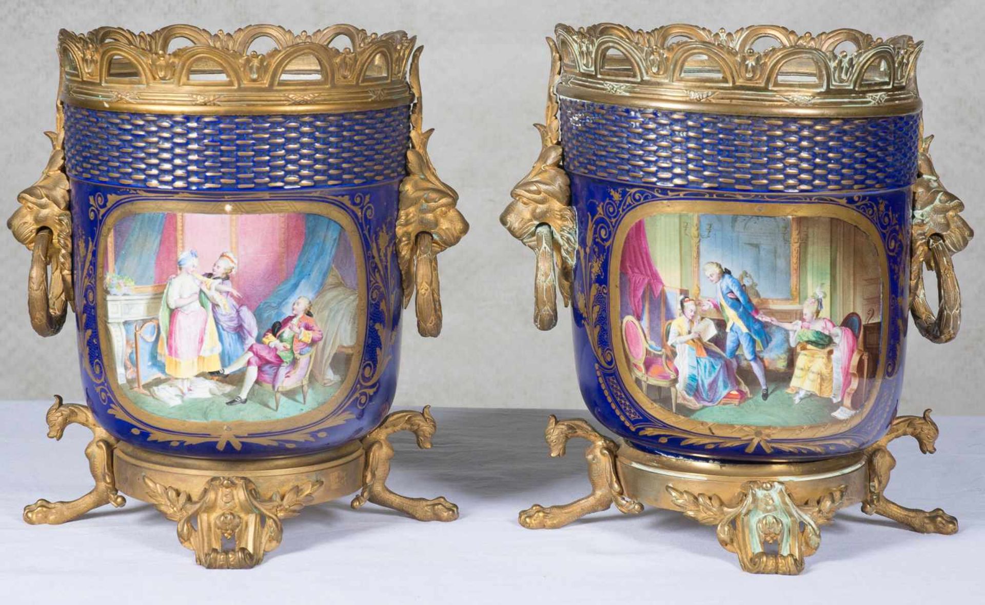 A pair of Sèvres porcelain and bronze cache-pot. 19th Century With stamped marks. One of them with a