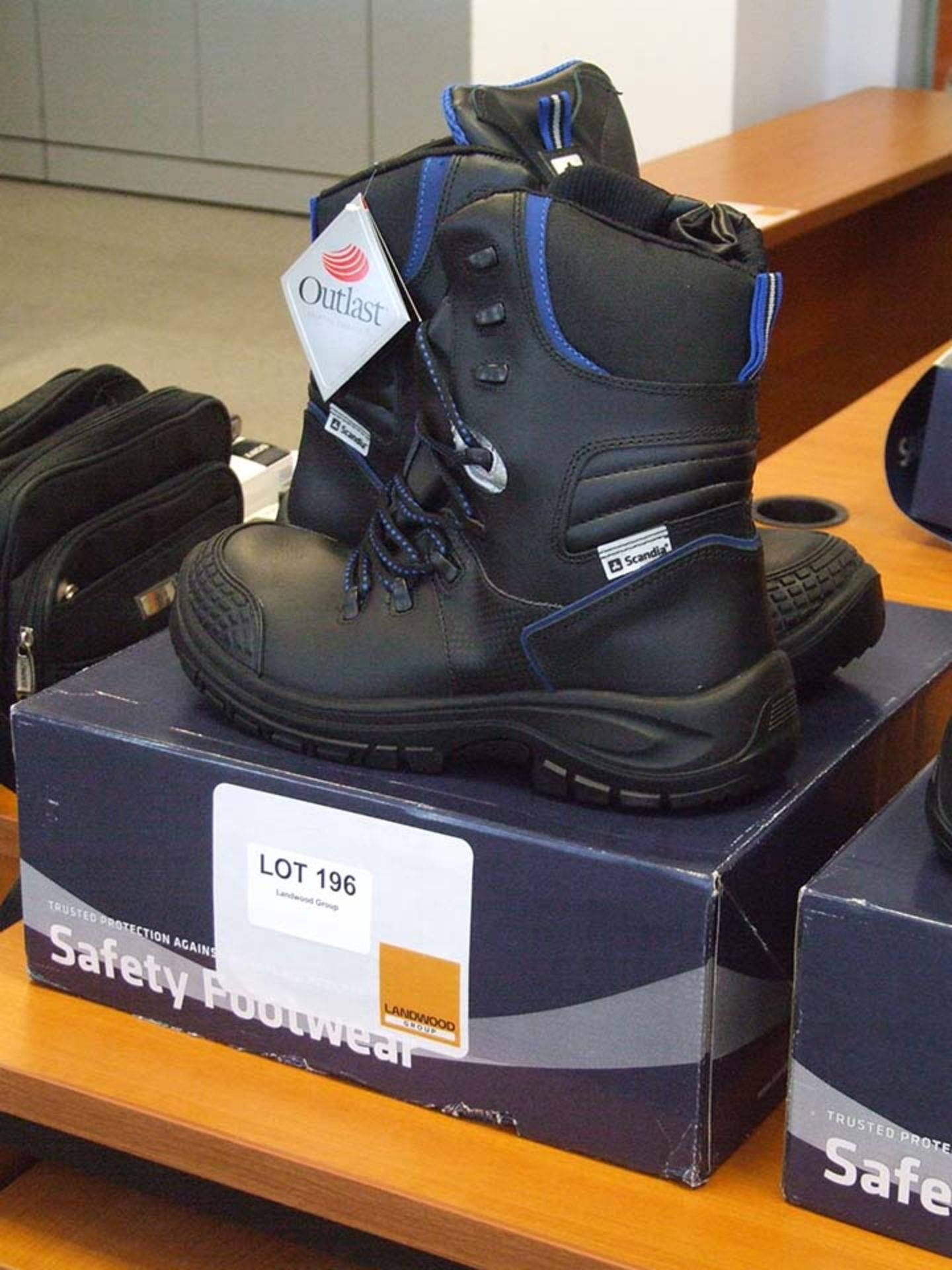 Pair of OUTLAST Black Size 10 Safety Boots in box