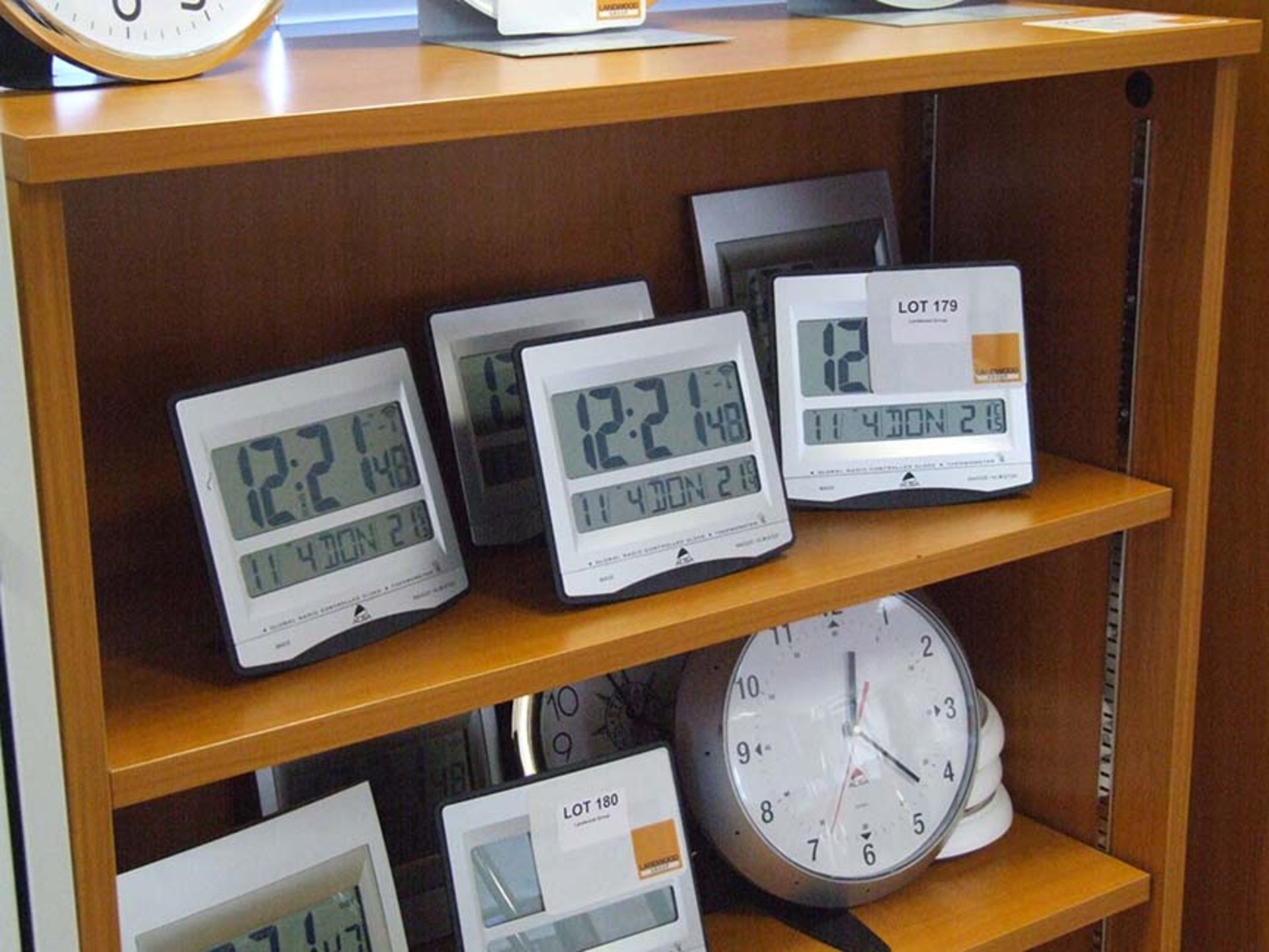 4 Radio controlled digital clocks on one shelf