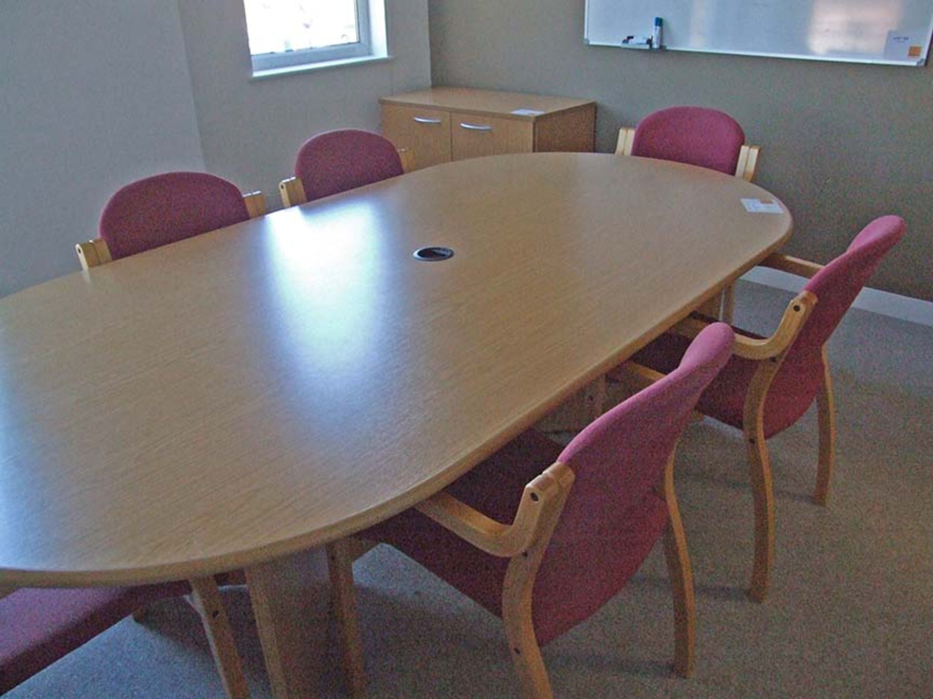 Oval meeting table approx 2430 x 1230 with 6 Arm Chairs and 2 door cupboard 1000 wide