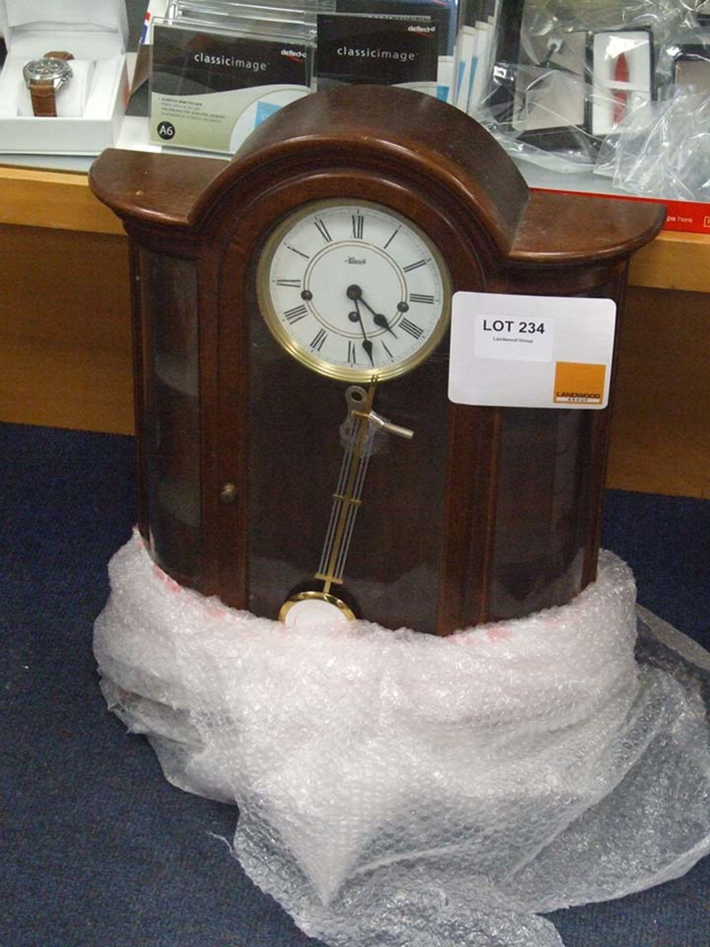 Wall Clock in Mahogany & glass case with pendulum