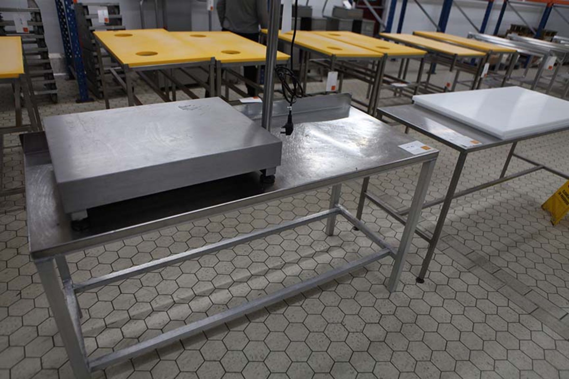 2 Stainless steel topped tables 1800 x 600 and 1530 x 610