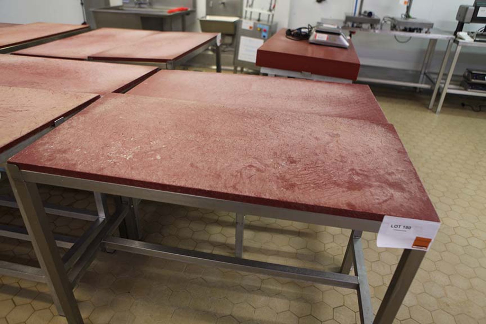 2 Meat preparation tables with Red tops 1200 x 600 mm