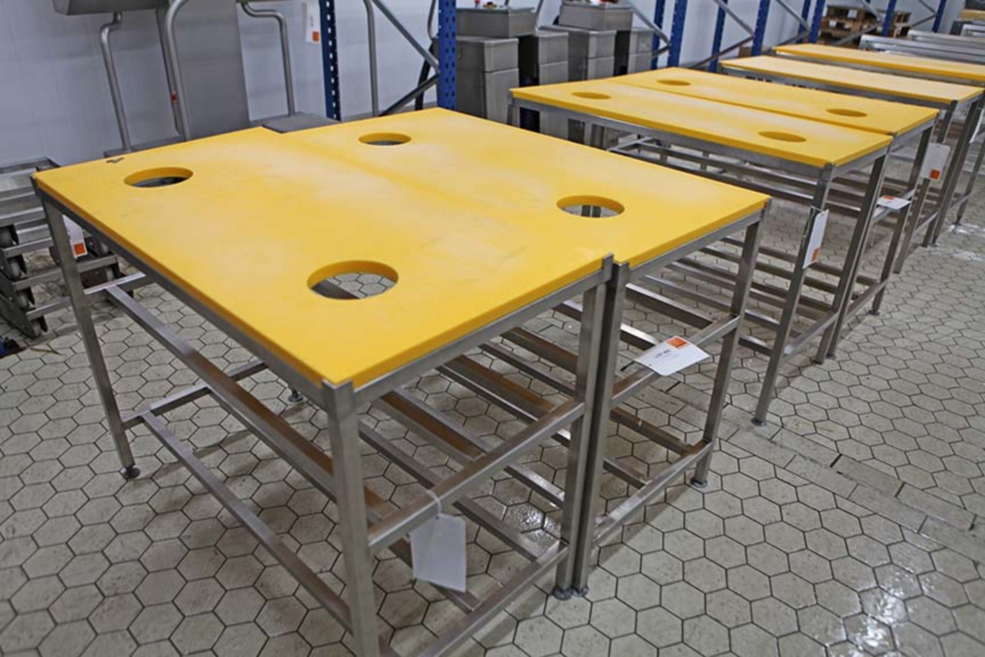 2 Meat preparation tables with Yellow tops and waste holes 1200 x 600 mm