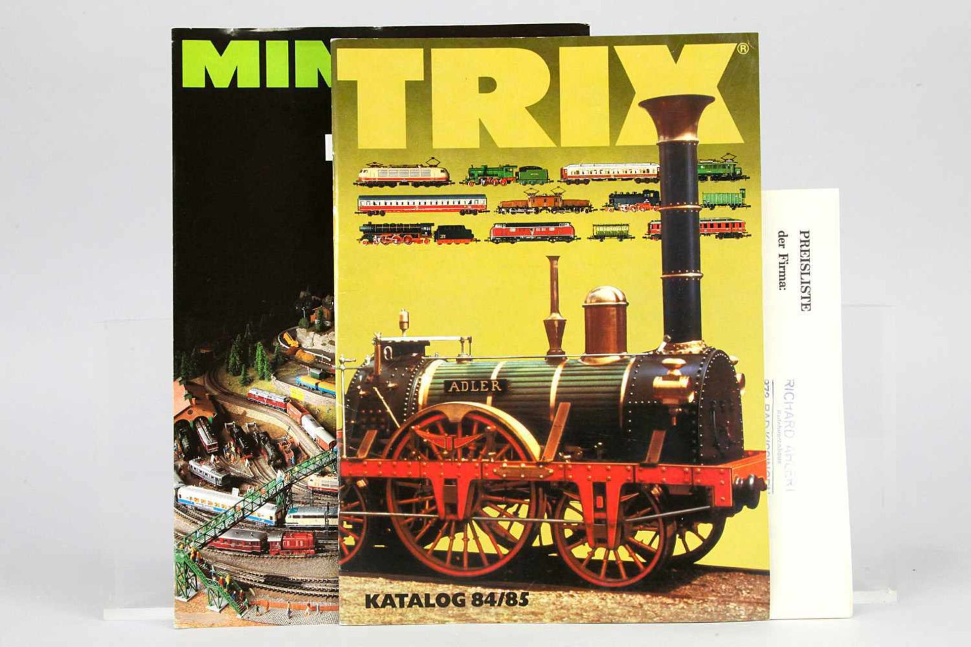 Konv. 2 Teile: "Trix Katalog 84/85", DIN A4, Hochformat, 115 Seiten, ohne Stempel, keine Notizen,