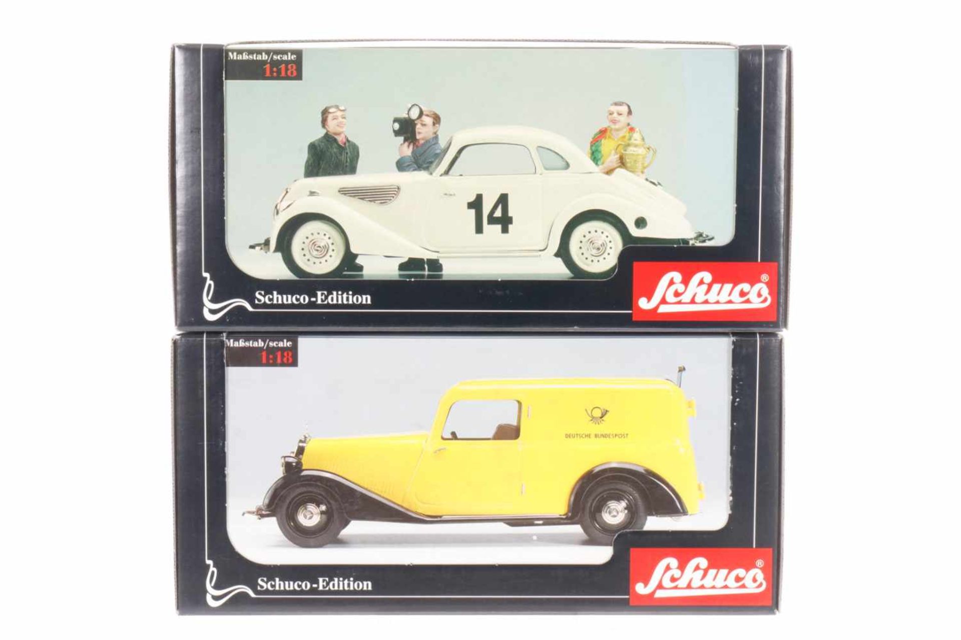 2 Schuco Autos, Nr. 00023 und 00034, Maßstab 1:18, je mit Schlüssel, Kleinzubehör und Anleitung, 1