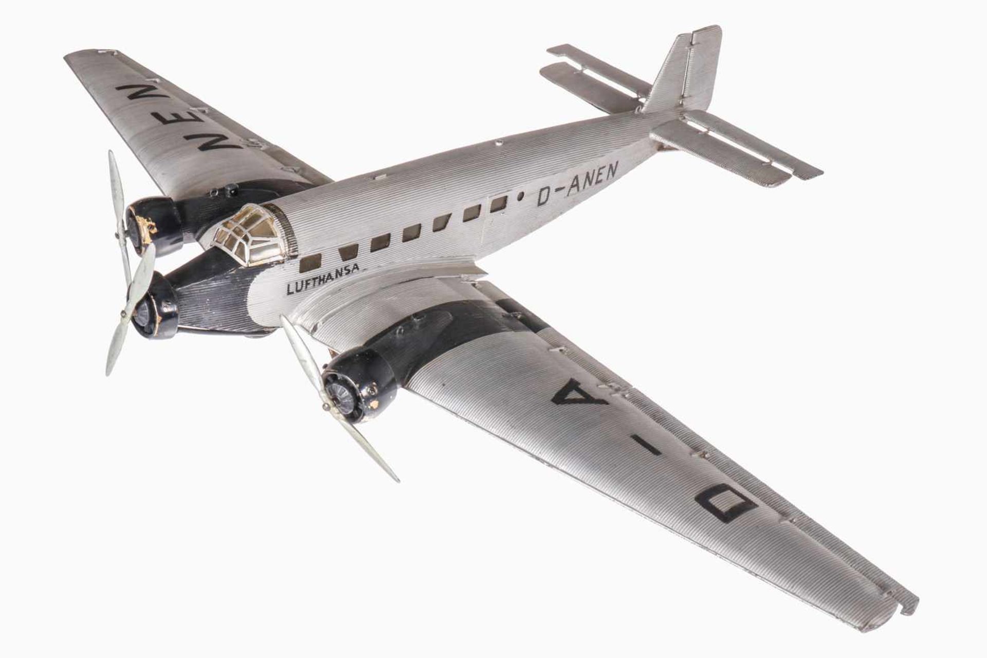 Märklin/Junkers Wellblechflugzeug JU-52, 3-motorig, handlackiert, seitliche Beschriftung ersetzt,