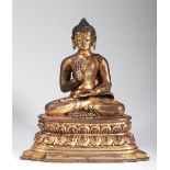 TIBETAN GILT BRONZE FIGURE OF SHAKYAMUNI