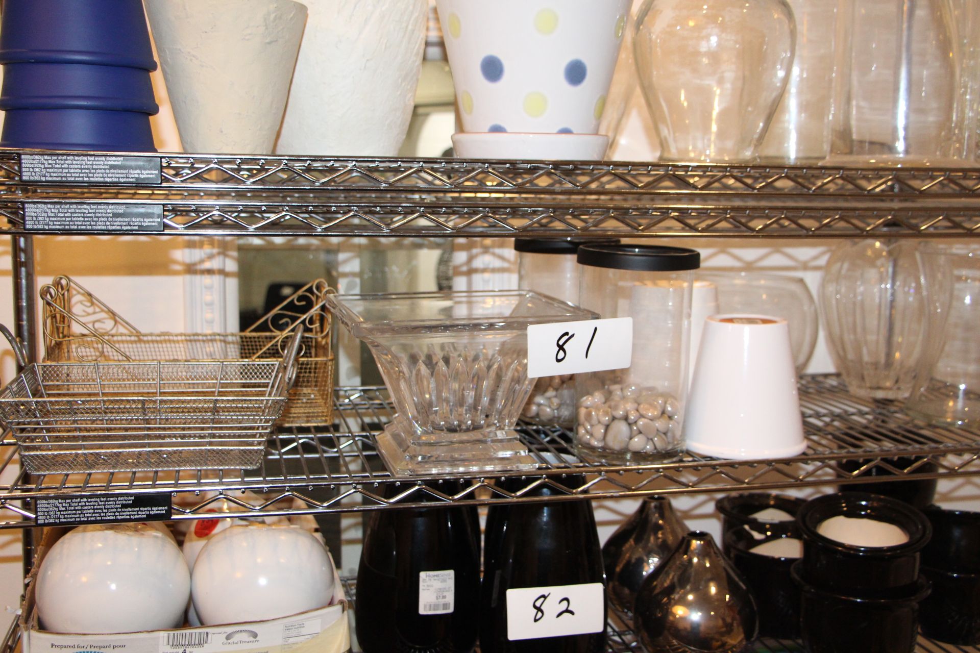 Lot assorted vases wire basket etc on shelf