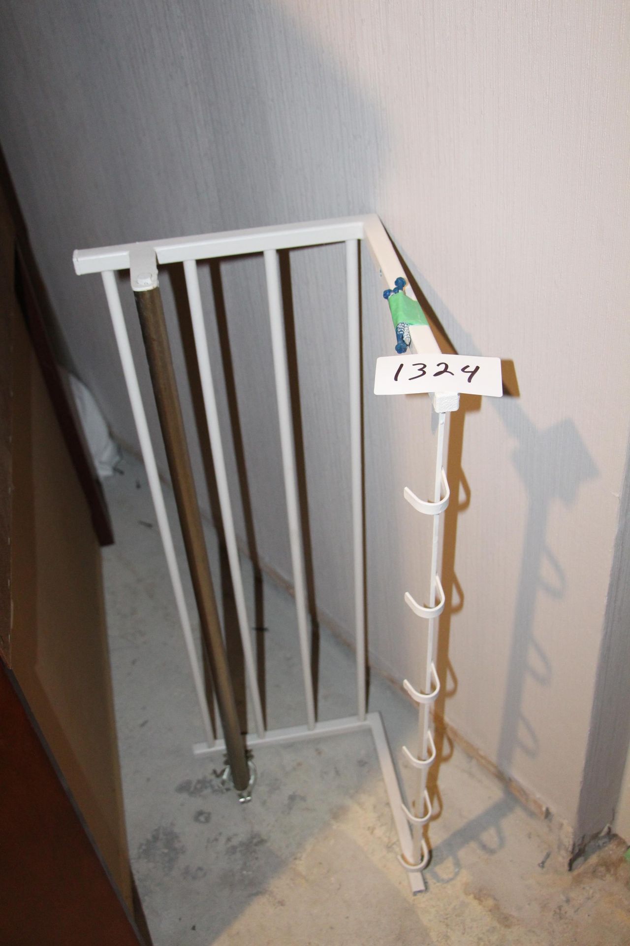 Metal wall hanging cloth rack w/ hangers (Room 130)