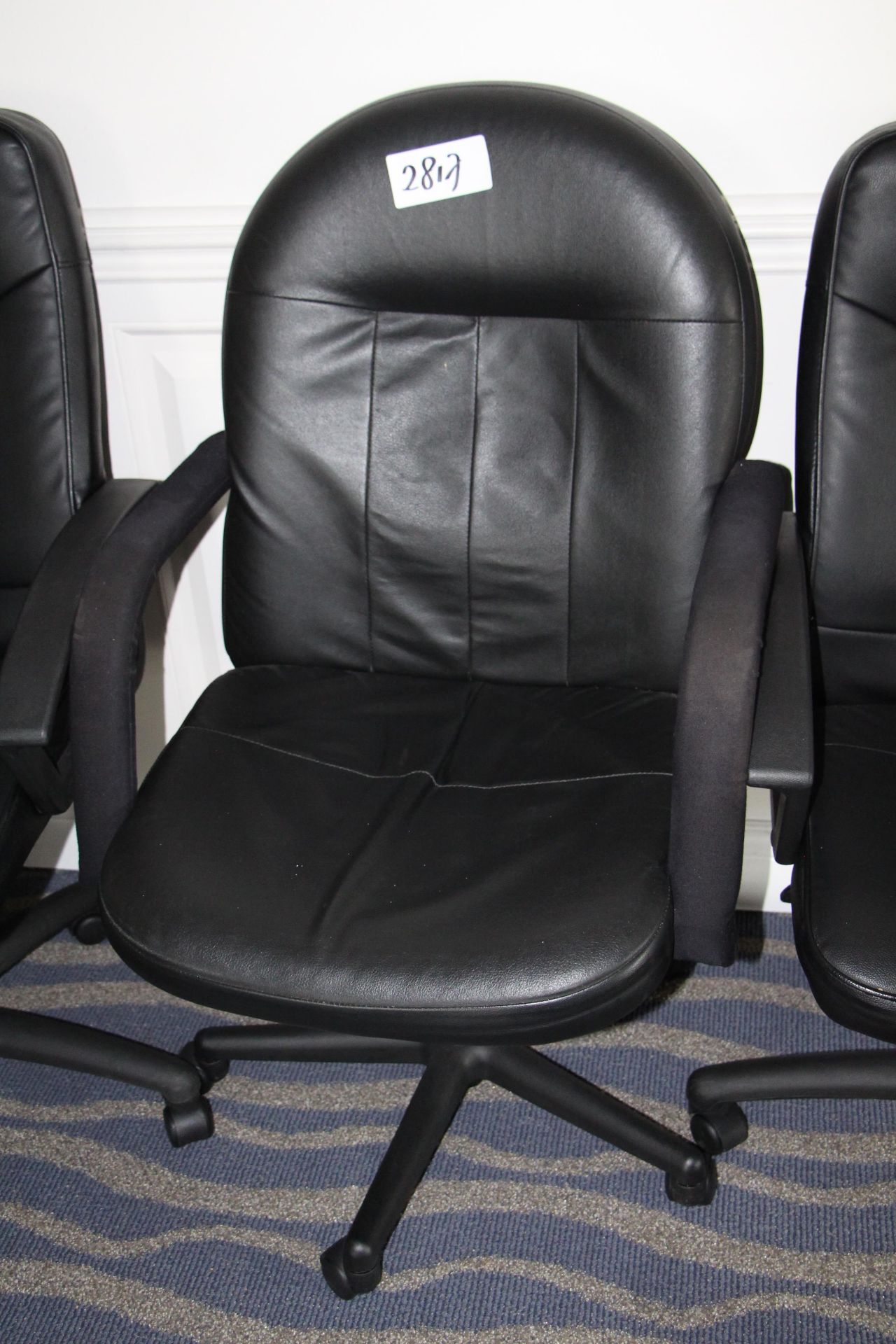 Black leather executive highback armchair