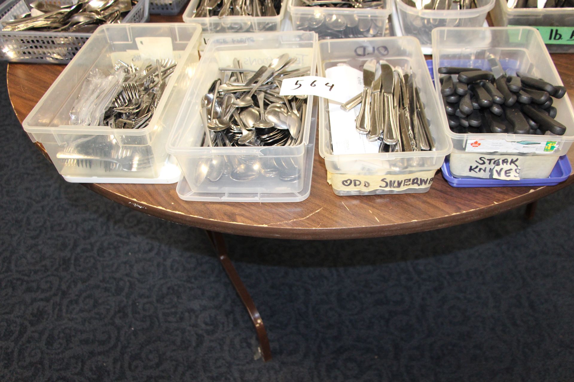 Lot 4 bins of misc flatware including forks, spoons, knifes and steak knifes