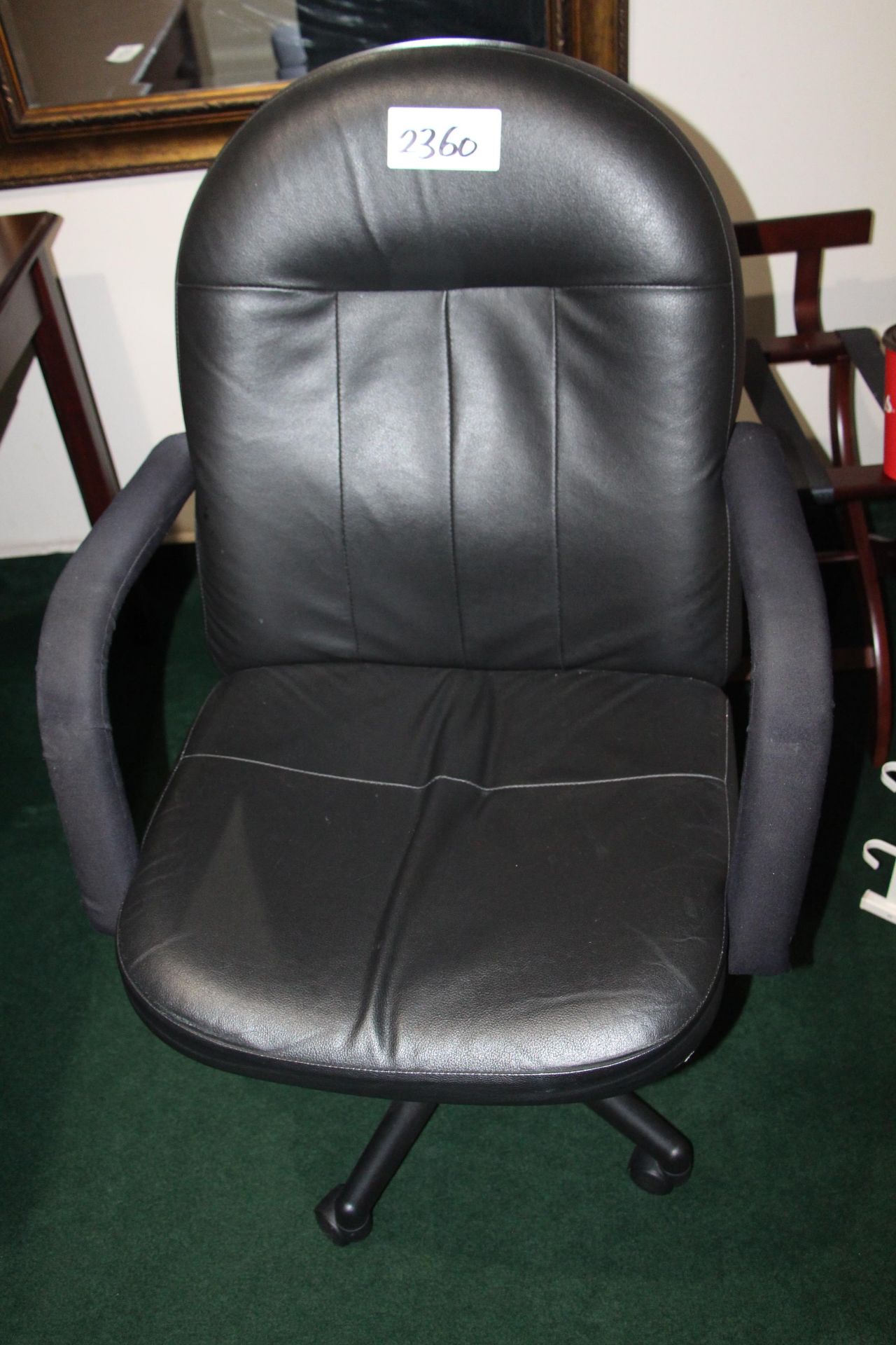 Black leather executive highback armchair
