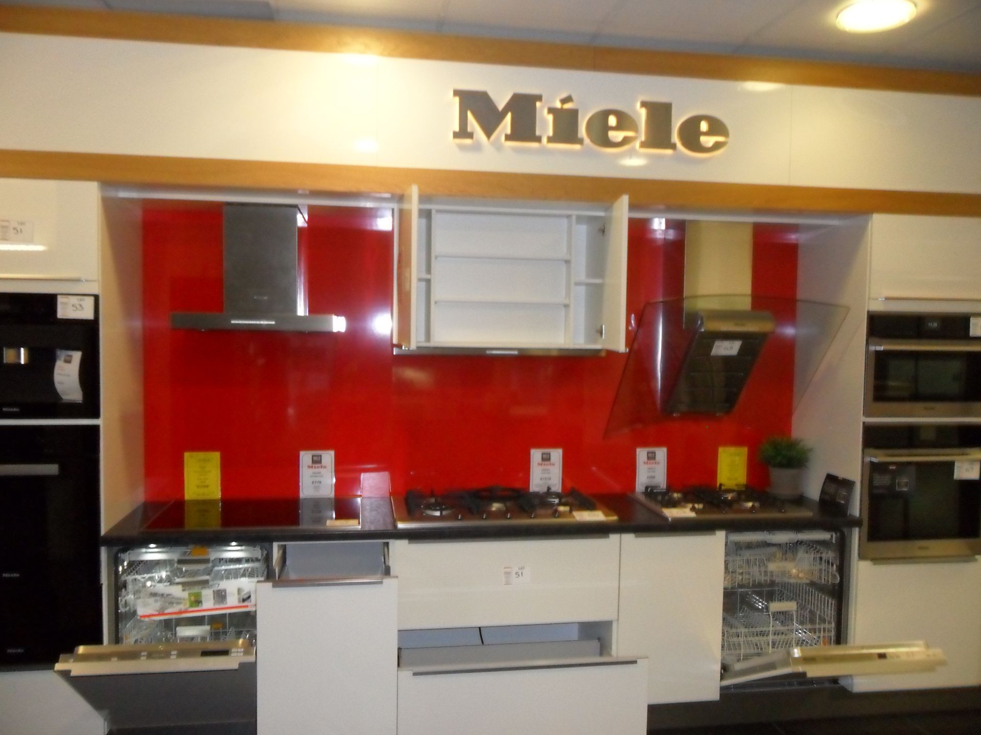 Miele cream FITTED KITCHEN with deep red splash back feature wall - Image 3 of 3