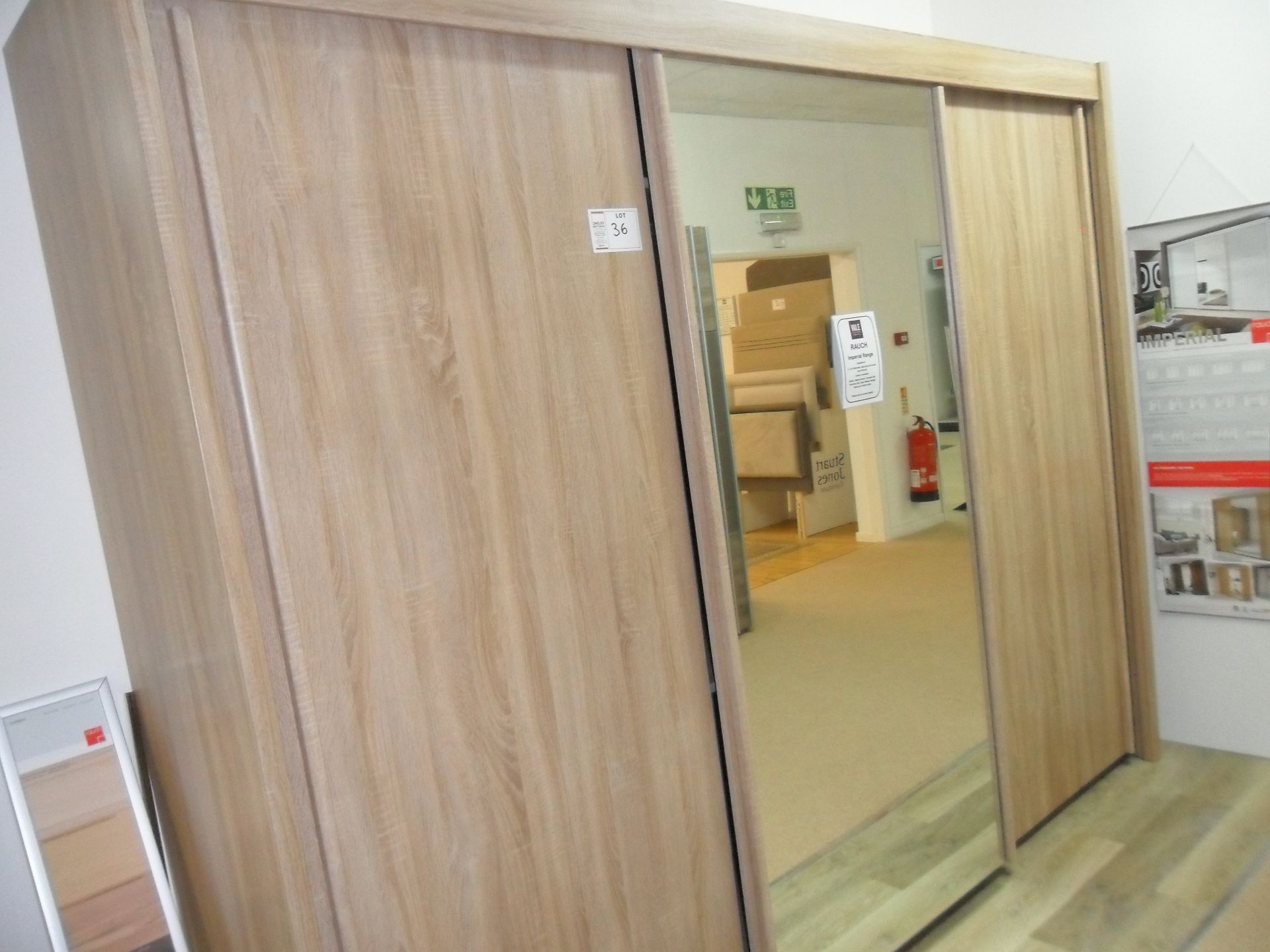 Rauch Imperial Range MIRRORED Triple Sliding door STORAGE WARDROBE,2800mm wide x 2200mm tall - Image 2 of 3