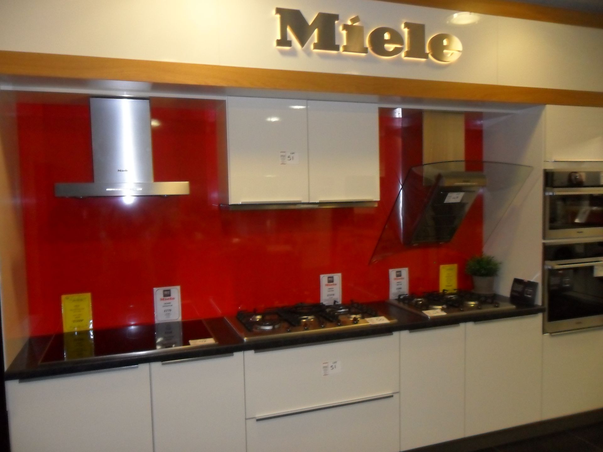Miele cream FITTED KITCHEN with deep red splash back feature wall - Image 2 of 3