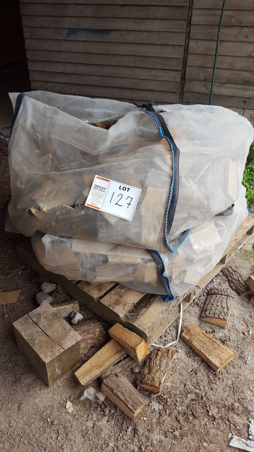 7 full and part jumbo bags of AIR DRIED LOGS