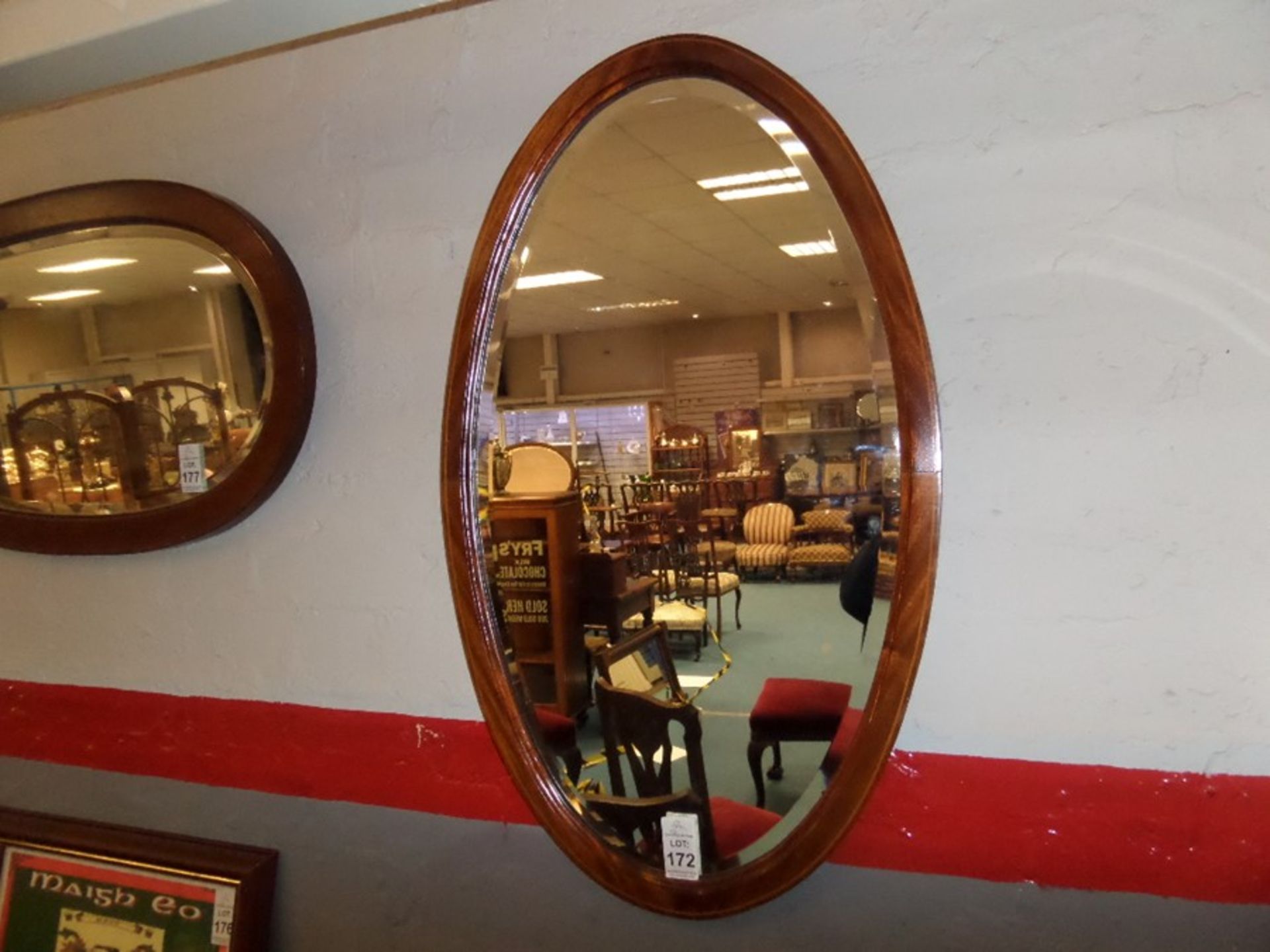 INLAID MAHOGANY OVAL BEVELLED MIRROR