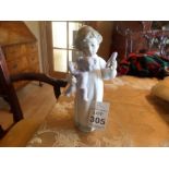 LLADRO NAO CHILD WITH TEDDY FIGURINE