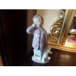 LLADRO NAO CHILD WITH TEDDY FIGURINE