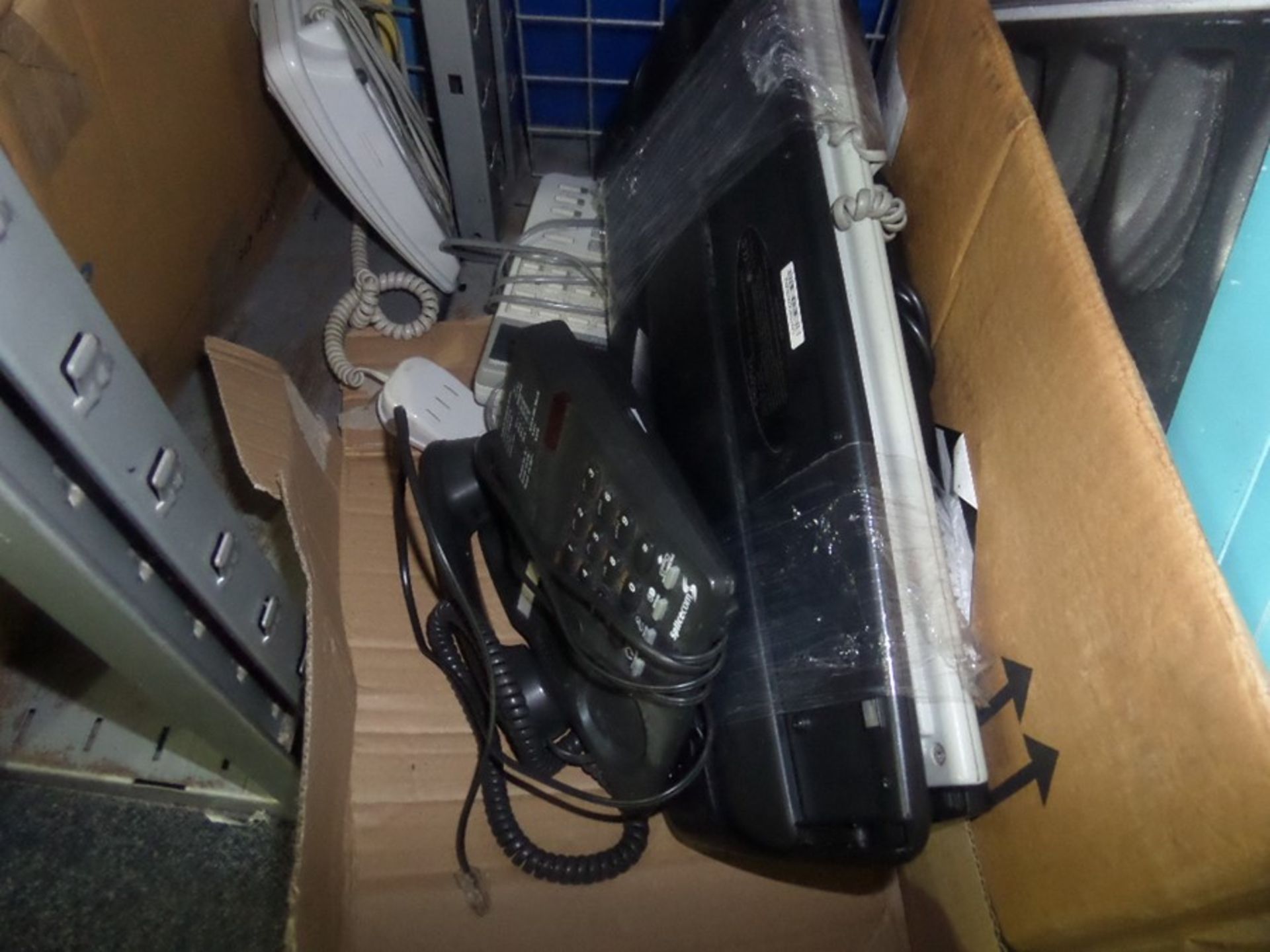 LOT OF COMPUTER KEYBOARDS AND TELEPHONES