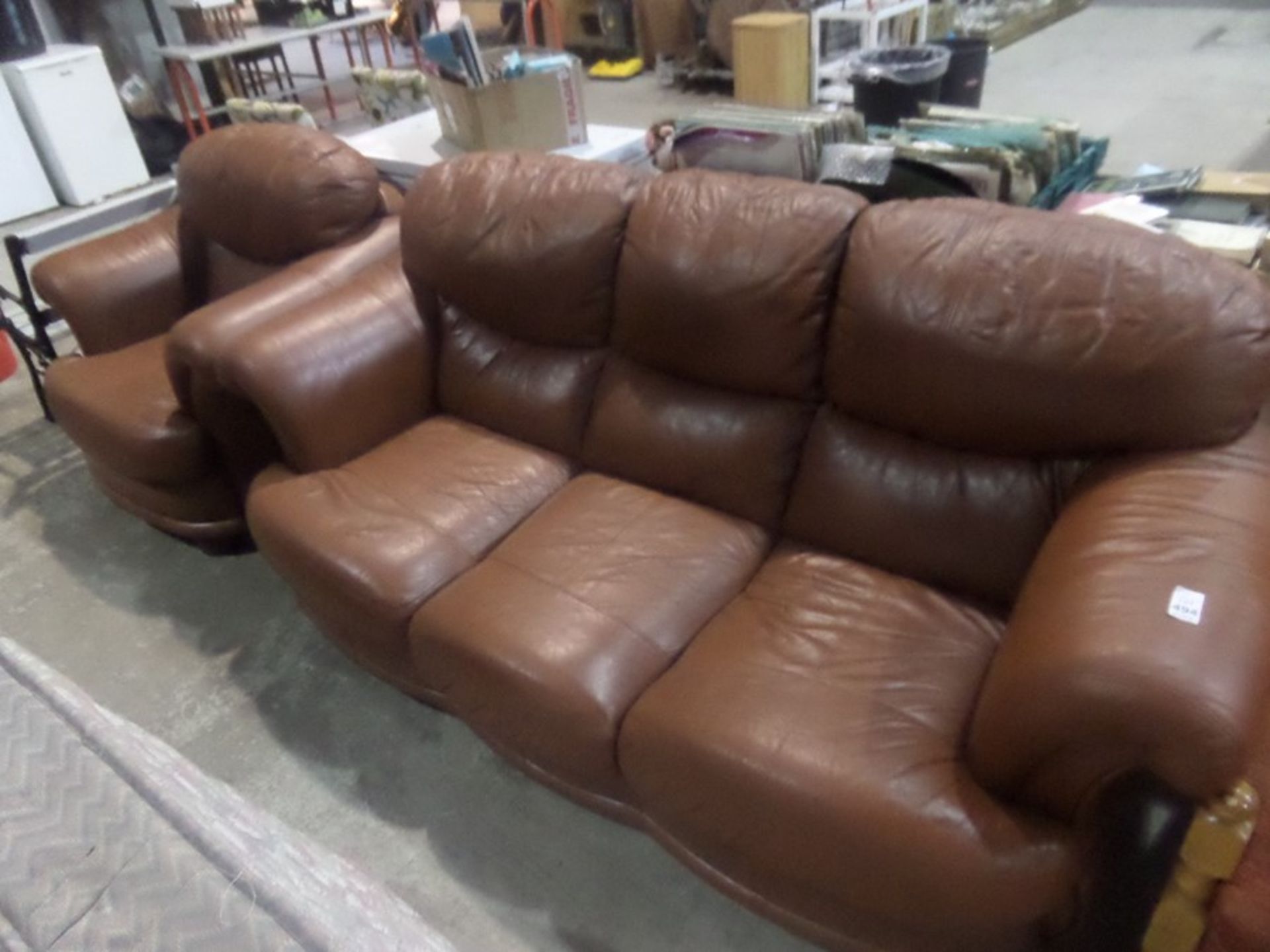 BROWN LEATHER SETTEE AND CHAIR