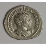 Caracalla silver antoninianus [double-denarius] Rome Mint 215 A.D., reverse:- Serapis standing