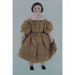 Miniature bisque head doll, circa late 19th to early 20th Century, in faded clothing, length 75mm