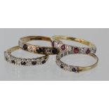 Four 9ct yellow gold gem and paste set half eternity rings, combined weight 8.5g