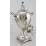 Victorian silver plated twin-handled tea urn. Approx 45cm tall