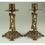 Pair of bronze arts & crafts candlesticks by WT&S, reg. 354515, height 17cm approx.