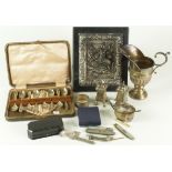 Silver. A collection of silver items, including jug, set of eight teaspoons, cruet items, pen knives