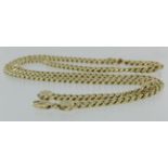 14ct yellow gold solid curb chain, 59cm long, weight 63g.