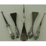 Mixed lot of silver mounted shoehorns (2) + silver mounted combined shoehorn & buttonhook along with
