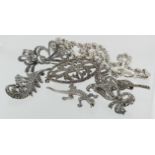 Six silver brooches set with marcasite, and silver rope chain necklace, total weight 71.4g