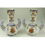 Vases. A pair of unusual French two handled hand painted vases, each with a crest depicting two