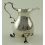 Mid 18th c. Silver cream jug. Hallmarks difficult to read - possibly London 1746. Stands on three