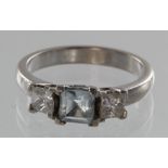 18ct white gold aquamarine and diamond three stone princess cut ring, finger size P, weight 5.8g