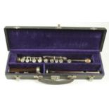 Rosewood flute, comprising of three pieces (unnamed), contained in a fitted case, flute length